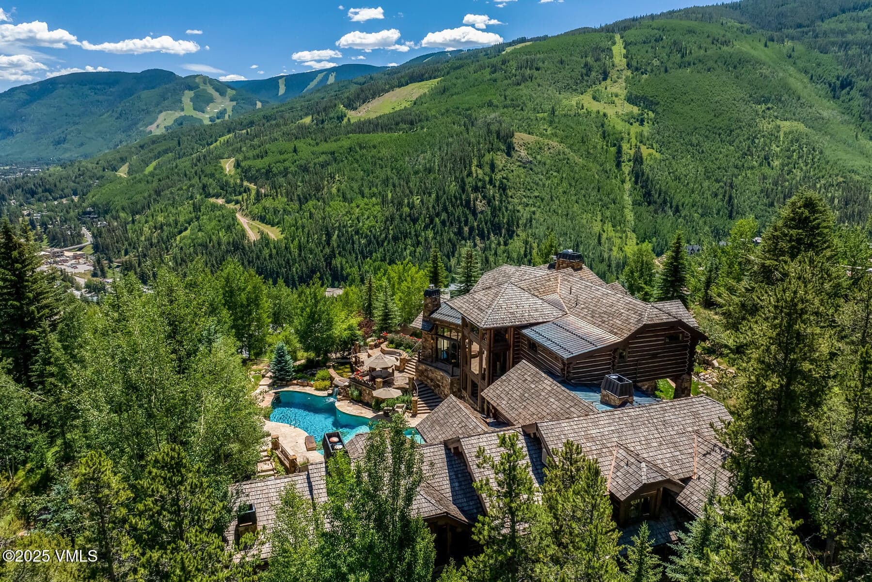 Aerial of home with view of mountains
